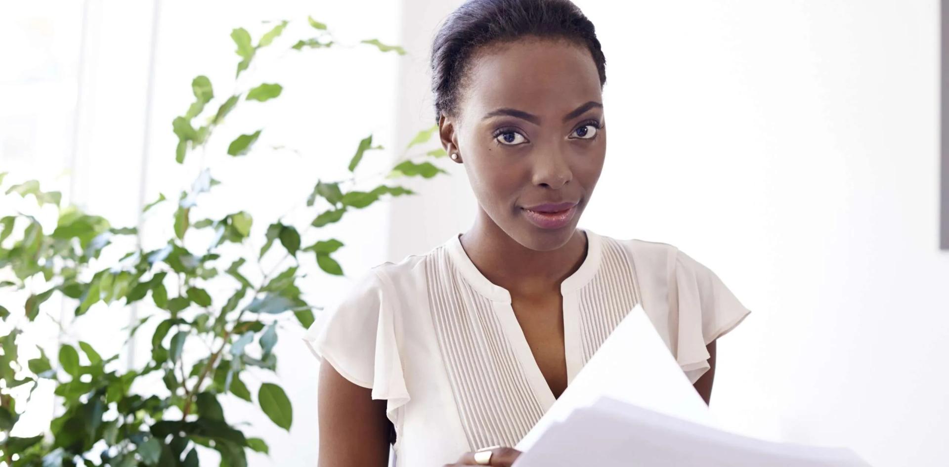 Administrator reviewing documents – business admin career imagery